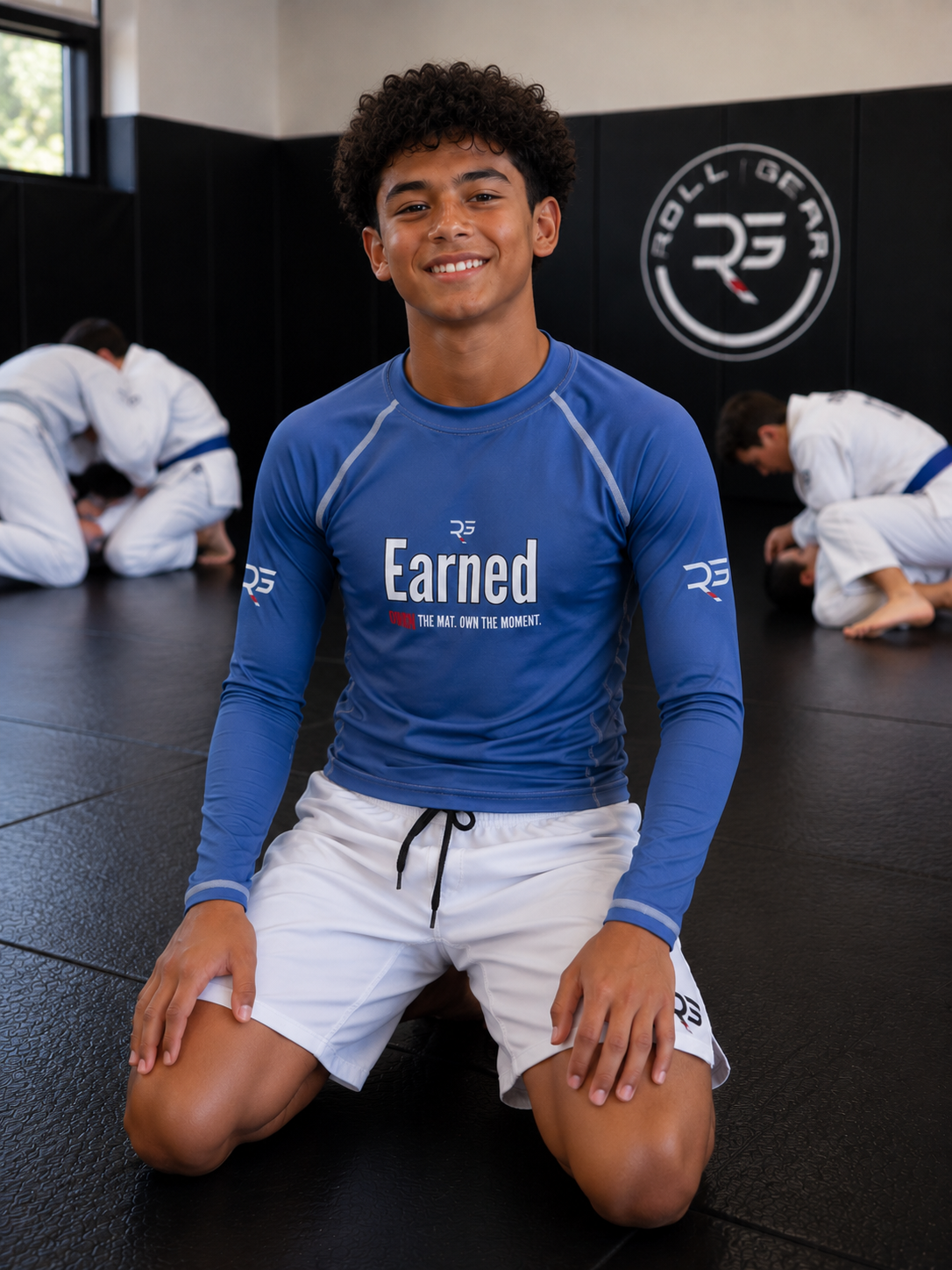 Earned Not Given Long Sleeve Rash Guard – Blue – Youth | Roll Gear
