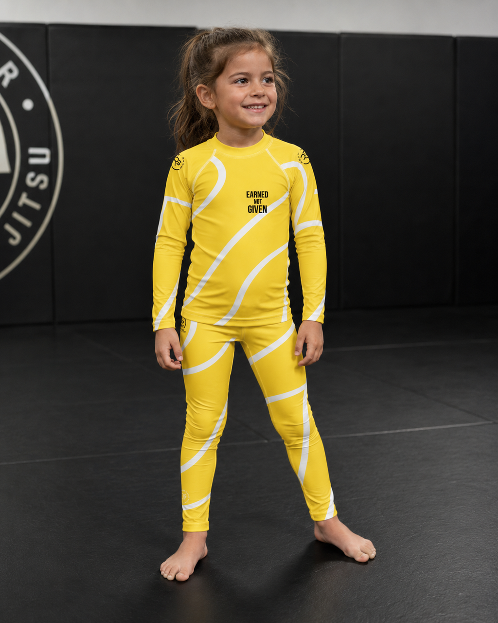 Roll Gear – Yellow Swirl Rash Guard – Yellow/White – Kids