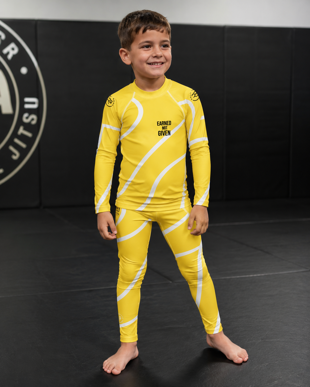 Roll Gear – Yellow Swirl Rash Guard – Yellow/White – Kids