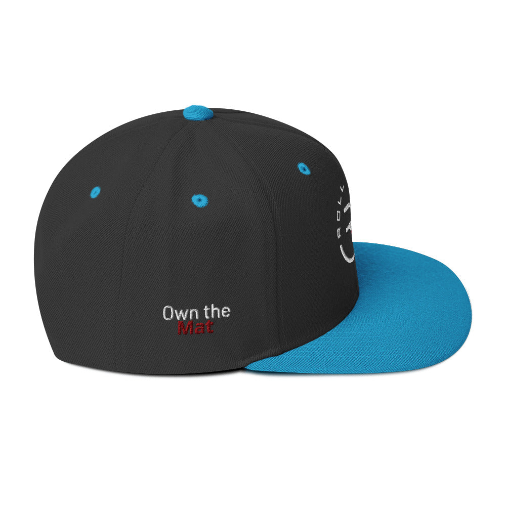 Athlete wearing Roll Gear light blue snapback – clean urban look for martial arts lifestyle branding
