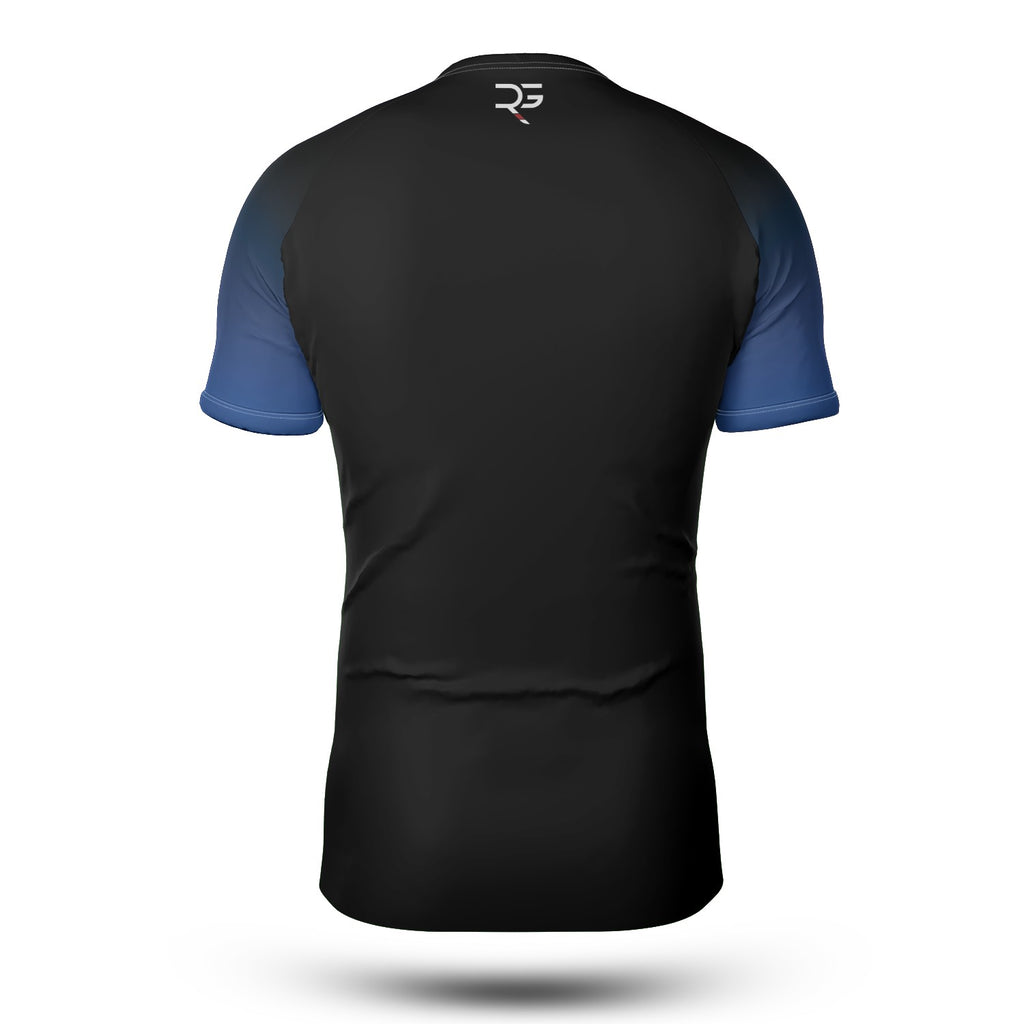 Rear view of blue belt no-gi BJJ rash guard featuring a blue chest and upper back stripe, designed for adult grapplers. Athletic fit with durable seams, moisture-wicking fabric, and “Own the Mat. Own the Moment.” slogan by Roll Gear LLC. Roll Gear