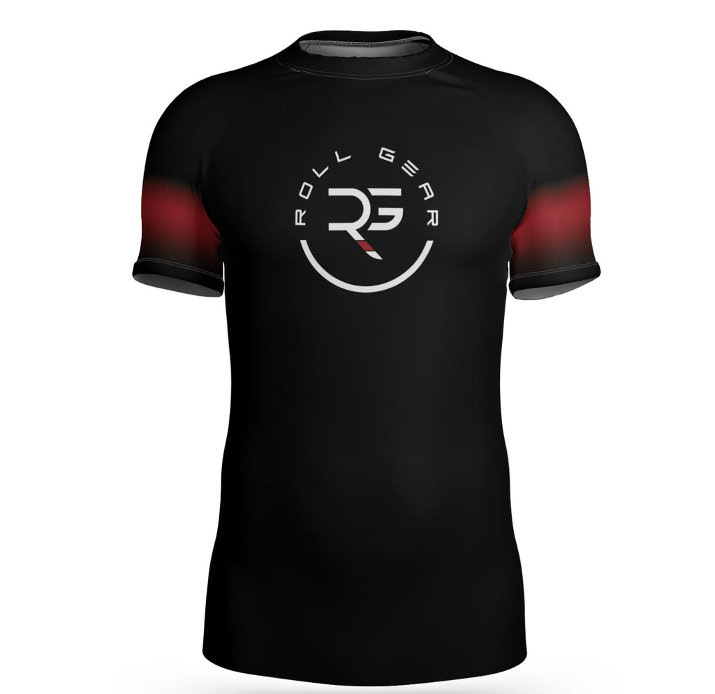 Front view of IBJJF-legal black belt short sleeve rash guard with bold red bar across the chest and Roll Gear branding. Designed for advanced BJJ athletes who demand performance, comfort, and compliance.