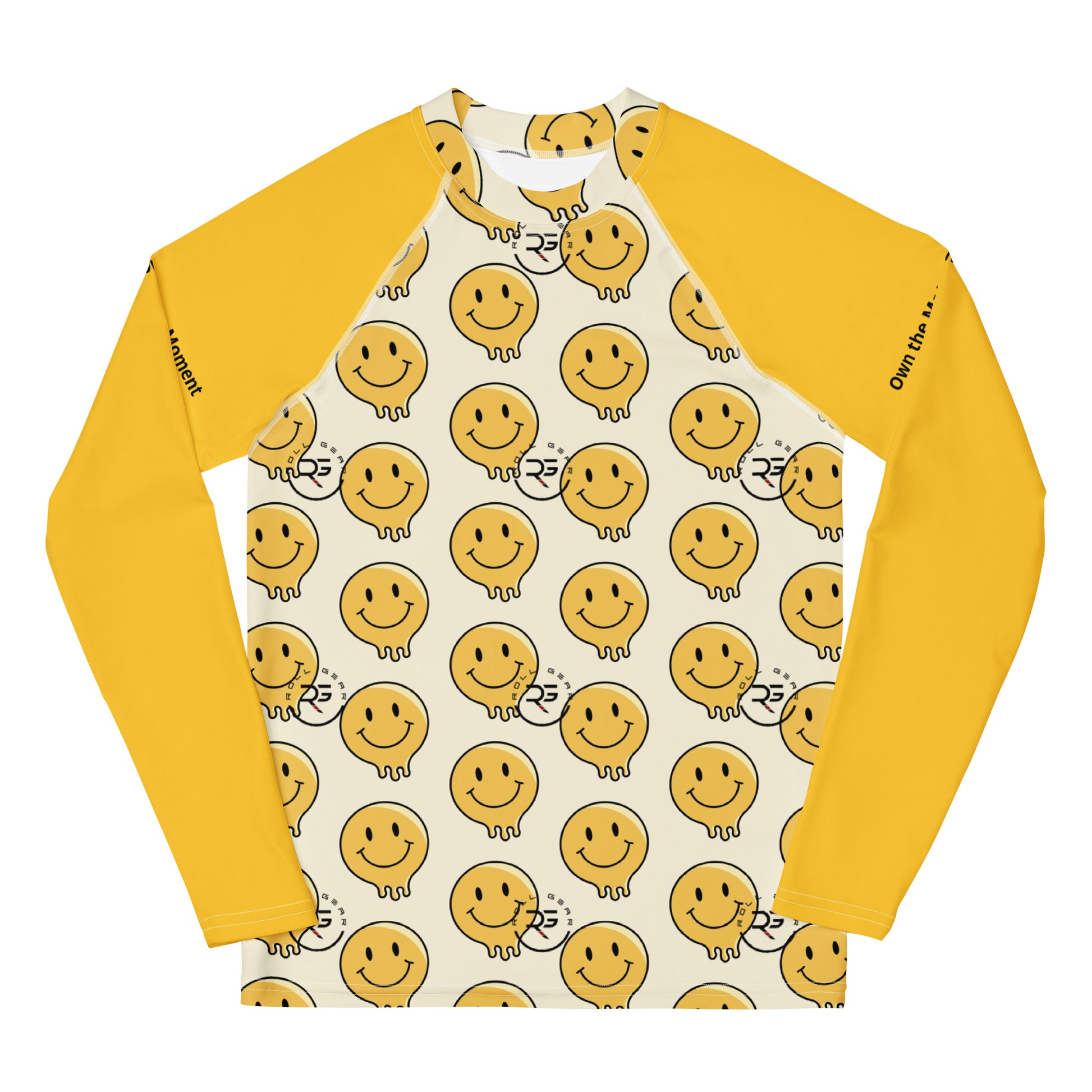 Youth rash guard front view – white base with repeating yellow smiley face pattern and solid gold sleeves; cheerful all-over print for playful training style by Roll Gear LLC.