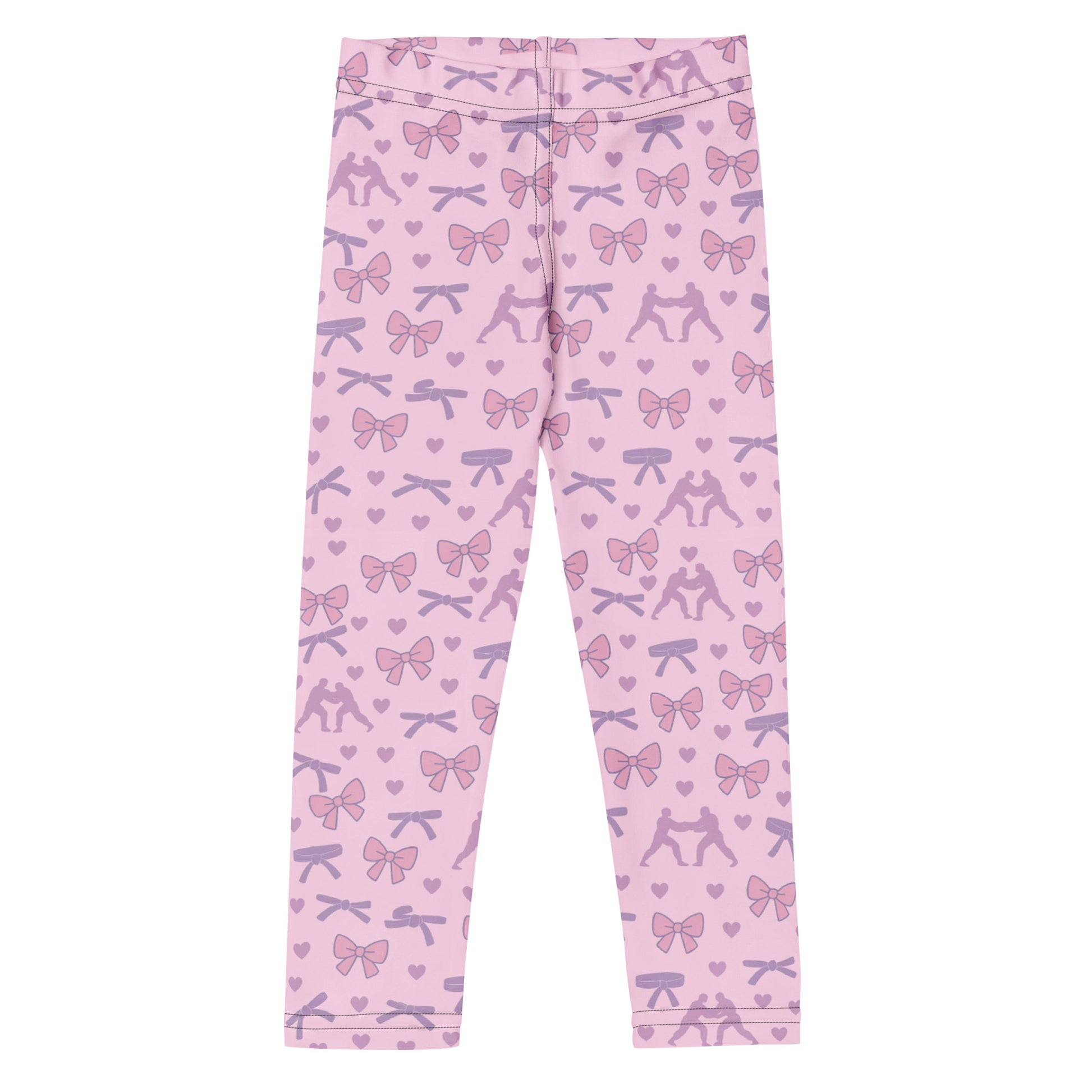 Kids BJJ spats in pink, black, and white with no text, designed to match the Bows, Belts & Armbars rash guard. Roll Gear
