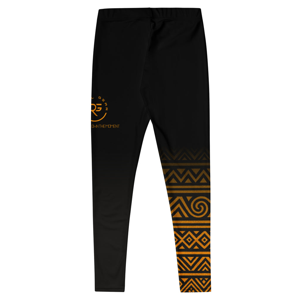 Black jogger pants with gold geometric pattern on a white background