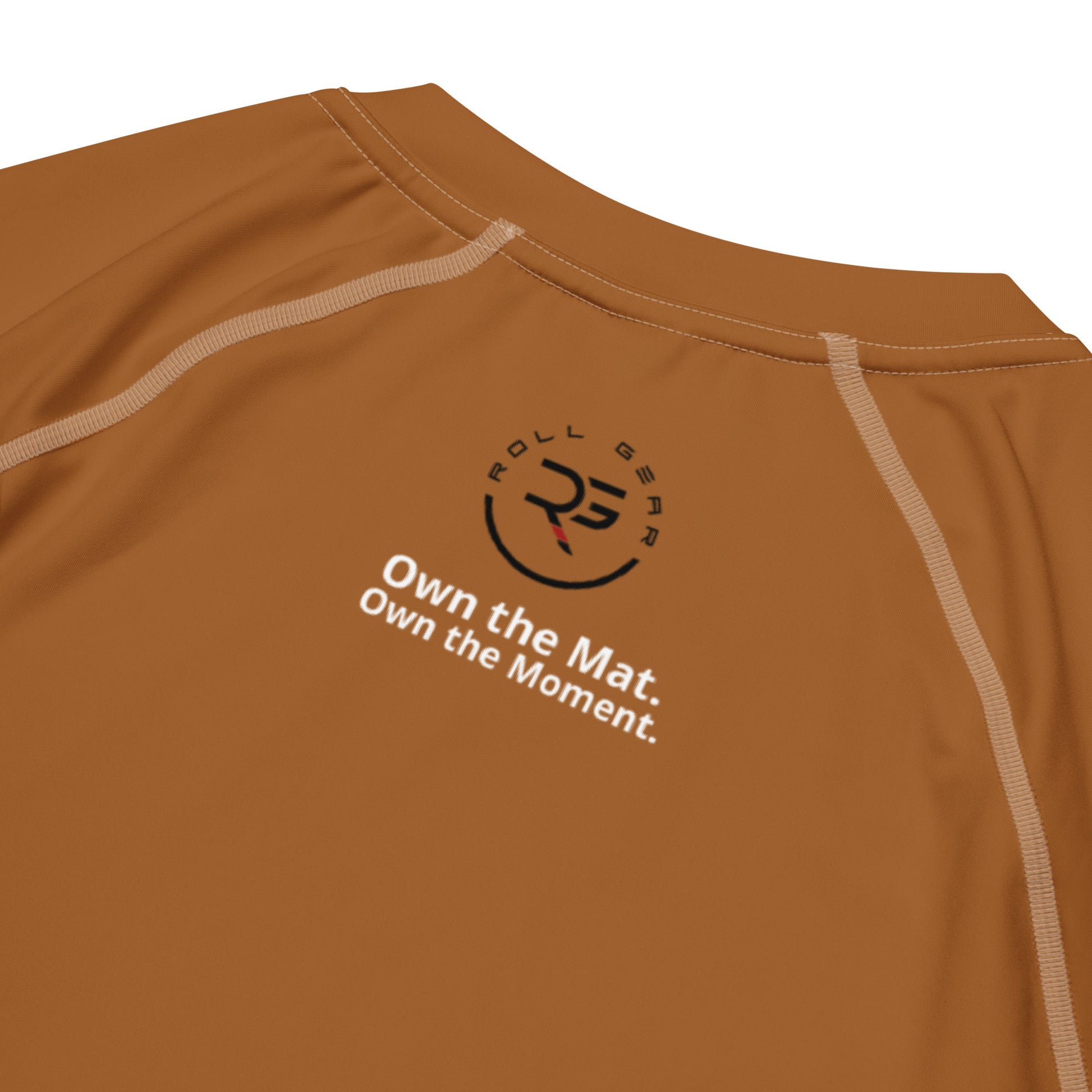 Back view of brown short sleeve BJJ rash guard with clean finish and athletic cut – ideal for advanced no-gi training, grappling, and brown belt jiu-jitsu practitioners
