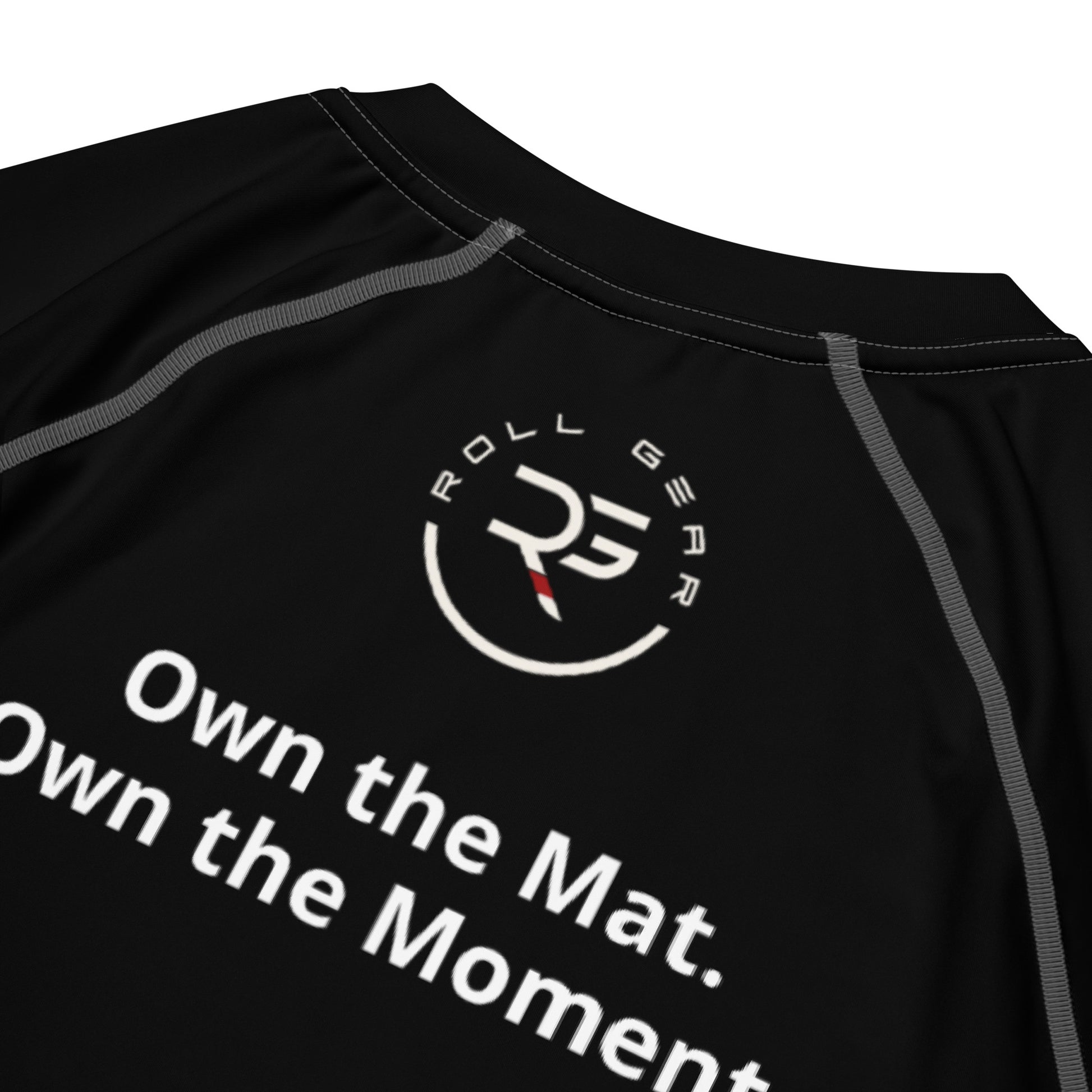 Back view of black short sleeve BJJ rash guard with grey stitching – sleek compression fit with no back graphics, ideal for no-gi training, MMA, and Brazilian Jiu-Jitsu
