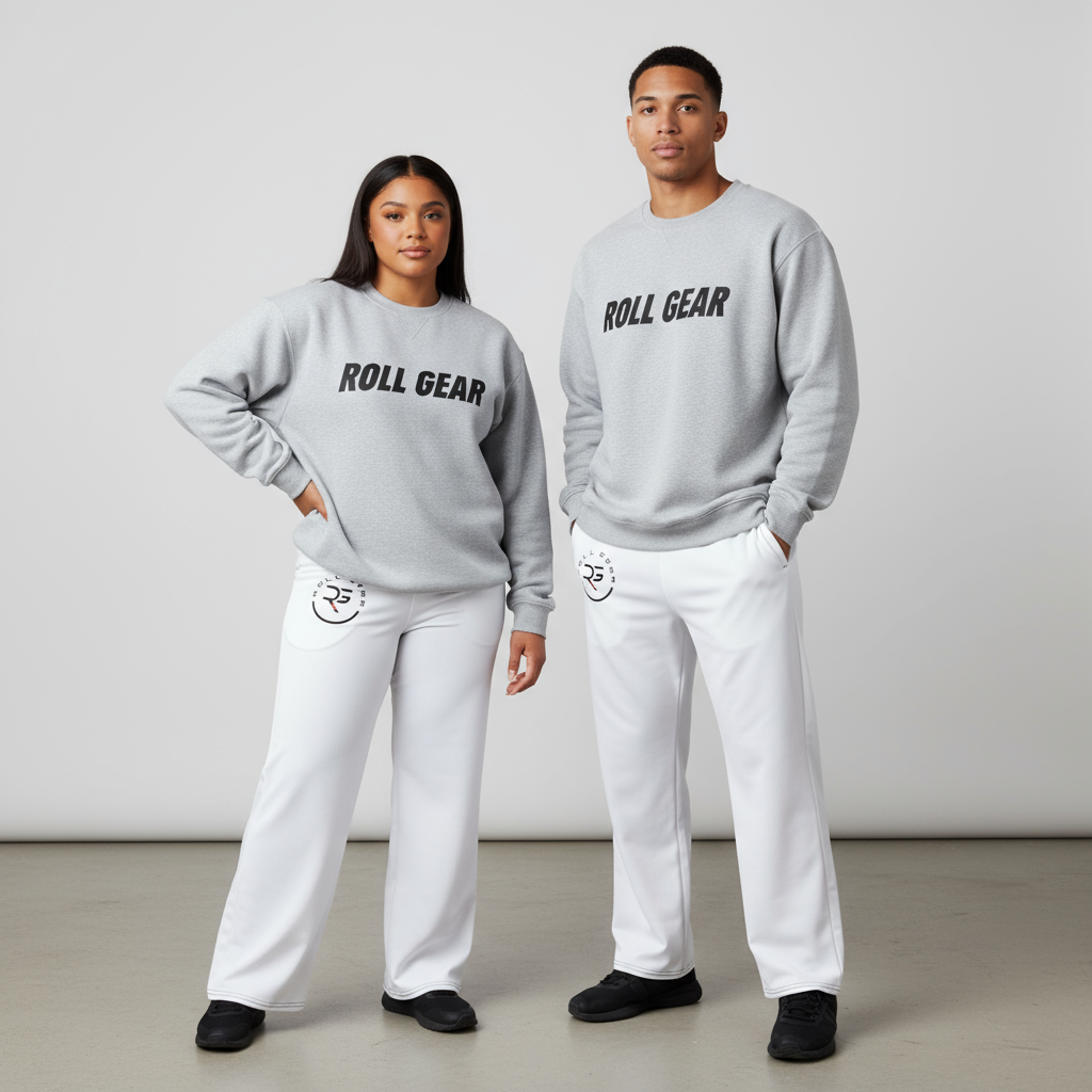 Two people wearing gray 'Roll Gear' sweatshirts and white pants against a plain background