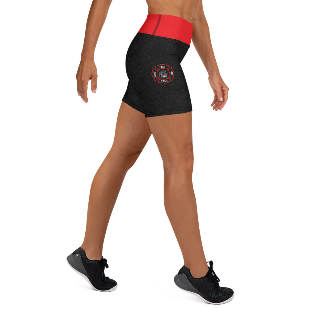 Black athletic shorts with red waistband on a white background