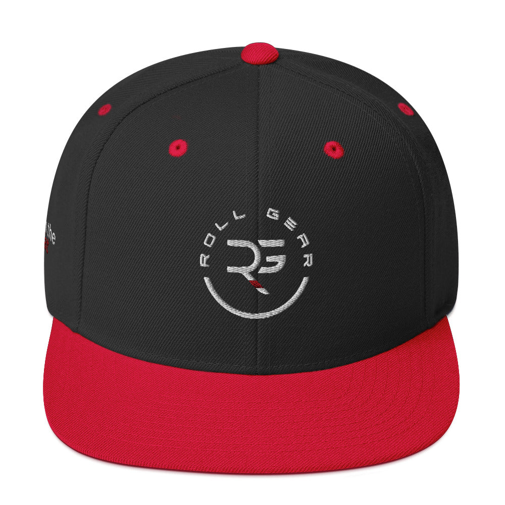 Athlete wearing Roll Gear snapback cap – martial arts streetwear look, flat brim, embroidered RG branding
