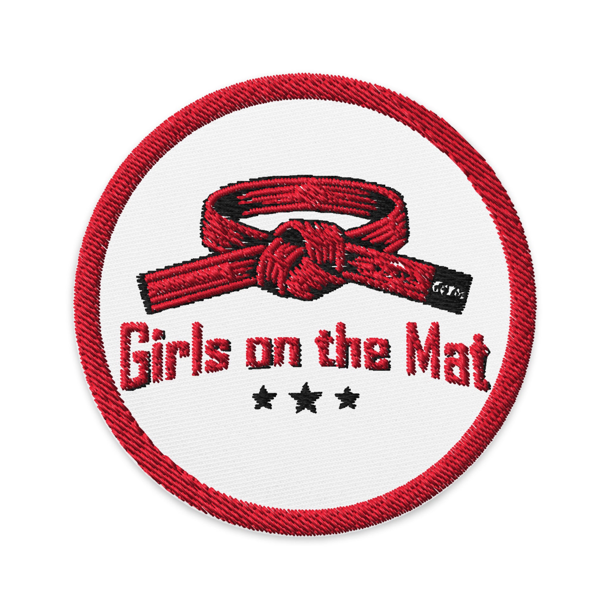 Patch with 'Girls on the Mat' text and red belt design on a white background