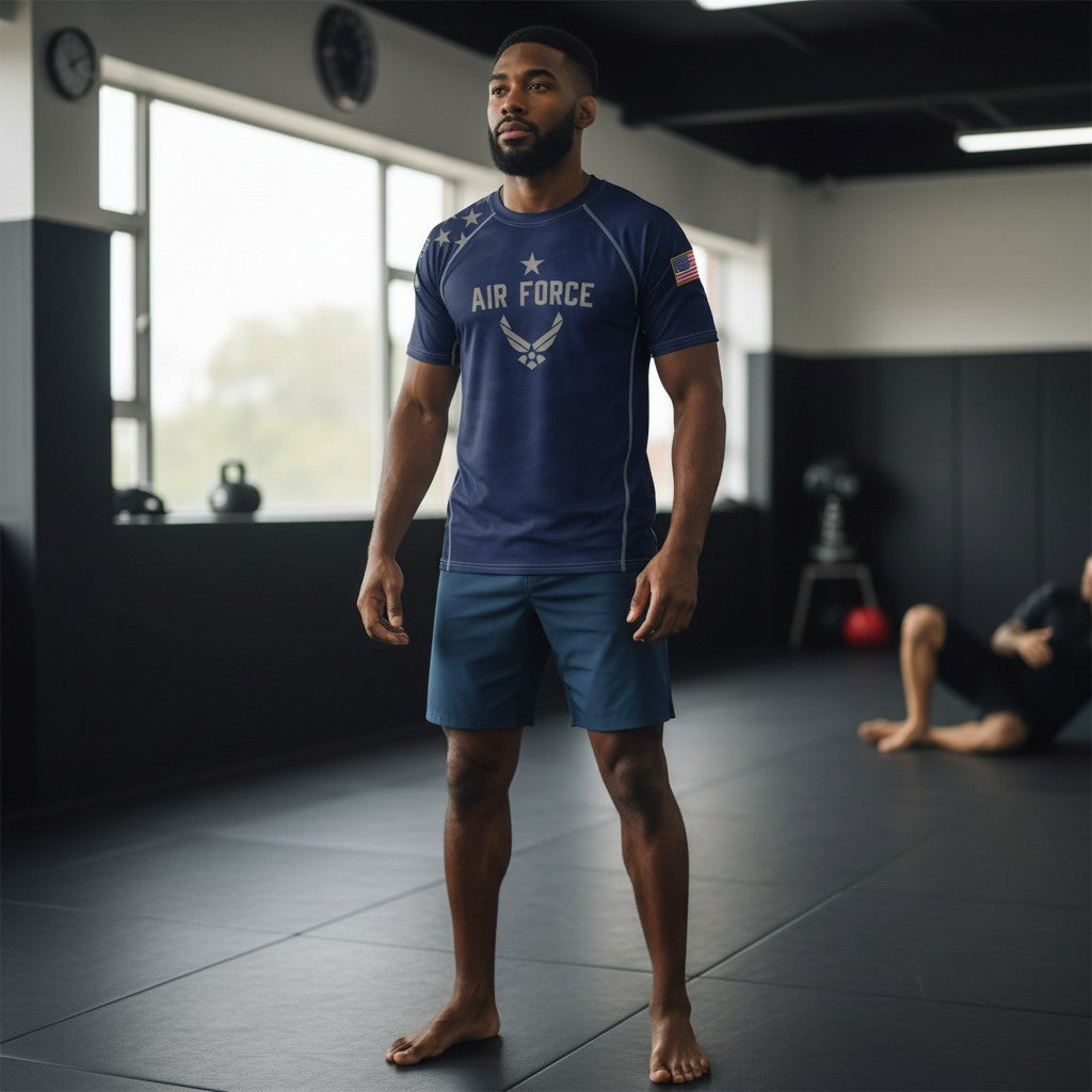 Roll Gear Unisex Air Force short sleeve rash guard in navy blue with Air Force graphics and US flag patch. Made from recycled polyester and elastane blend.