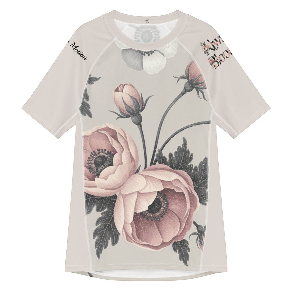 Roll Gear Always Blooming women's short sleeve rash guard with pink floral print and UPF 50+ protection.