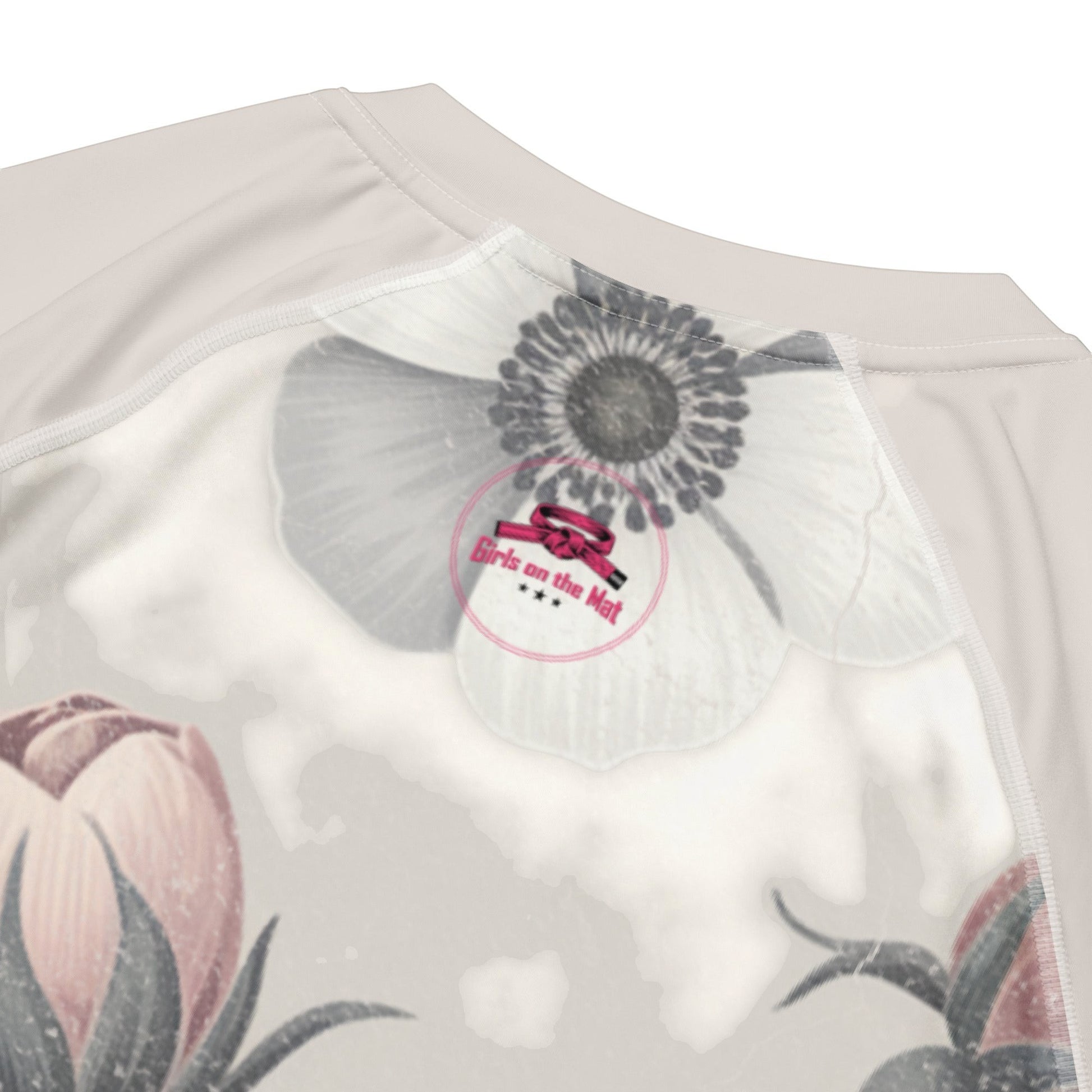 Roll Gear Always Blooming women's short sleeve rash guard with floral print and UPF 50+ protection.