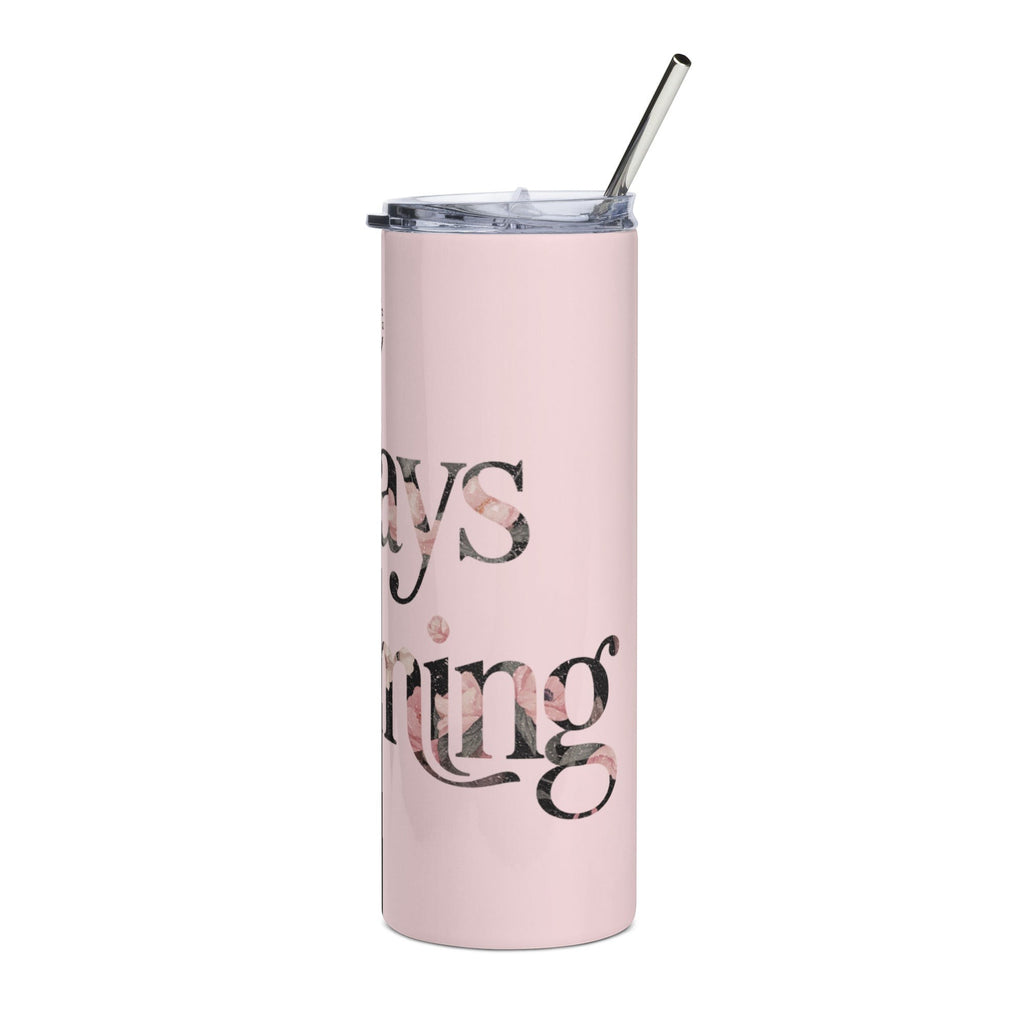 Roll Gear light pink 20 oz stainless steel tumbler with floral text that reads "Always Blooming" and a metal straw.