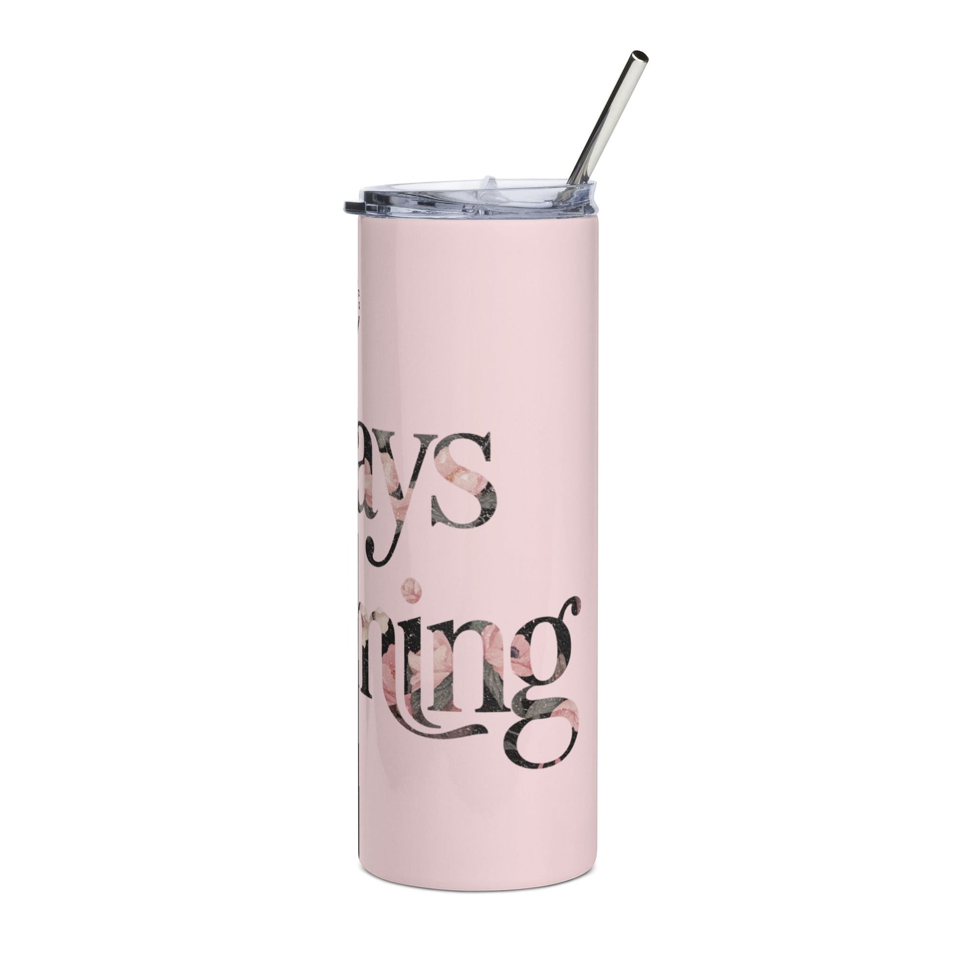 Roll Gear light pink 20 oz stainless steel tumbler with floral text that reads "Always Blooming" and a metal straw.
