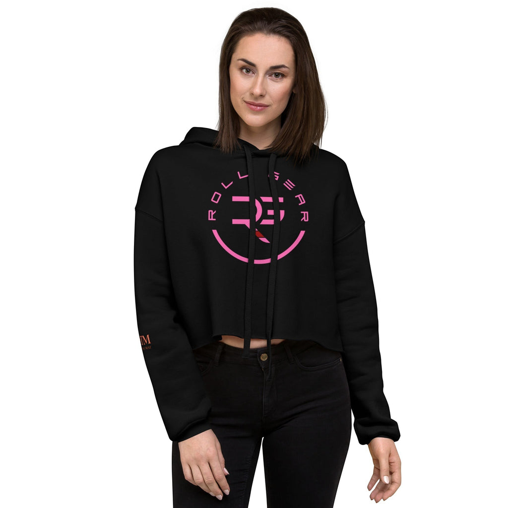 Roll Gear women's black cropped hoodie with pink logo on chest and sleeve. Model is wearing black jeans.