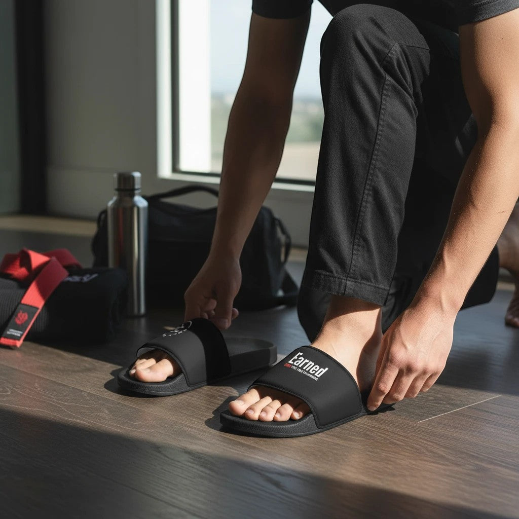 Roll Gear black men's slides with cushioned footbed and secure strap, ideal for recovery.