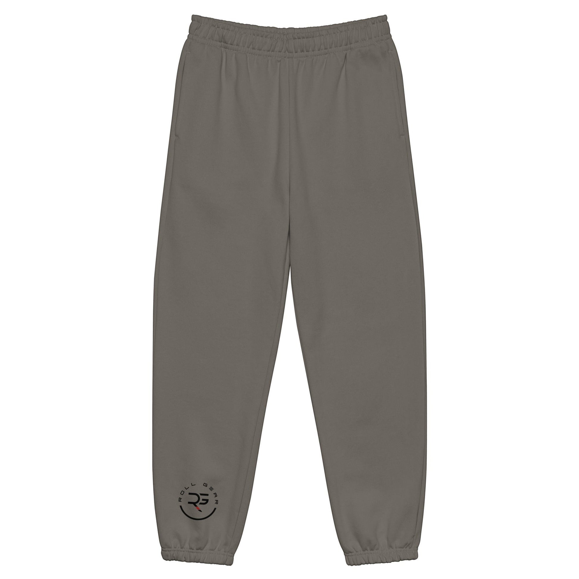 Roll Gear™ heavyweight grey cotton-poly fleece joggers with elastic cuffs and subtle logo detail near the ankle.
