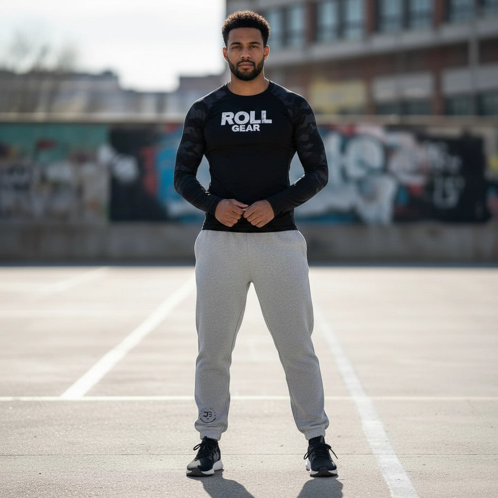 Roll Gear

Heavyweight grey cotton-poly fleece joggers with a relaxed fit and subtle logo detail on the left ankle.