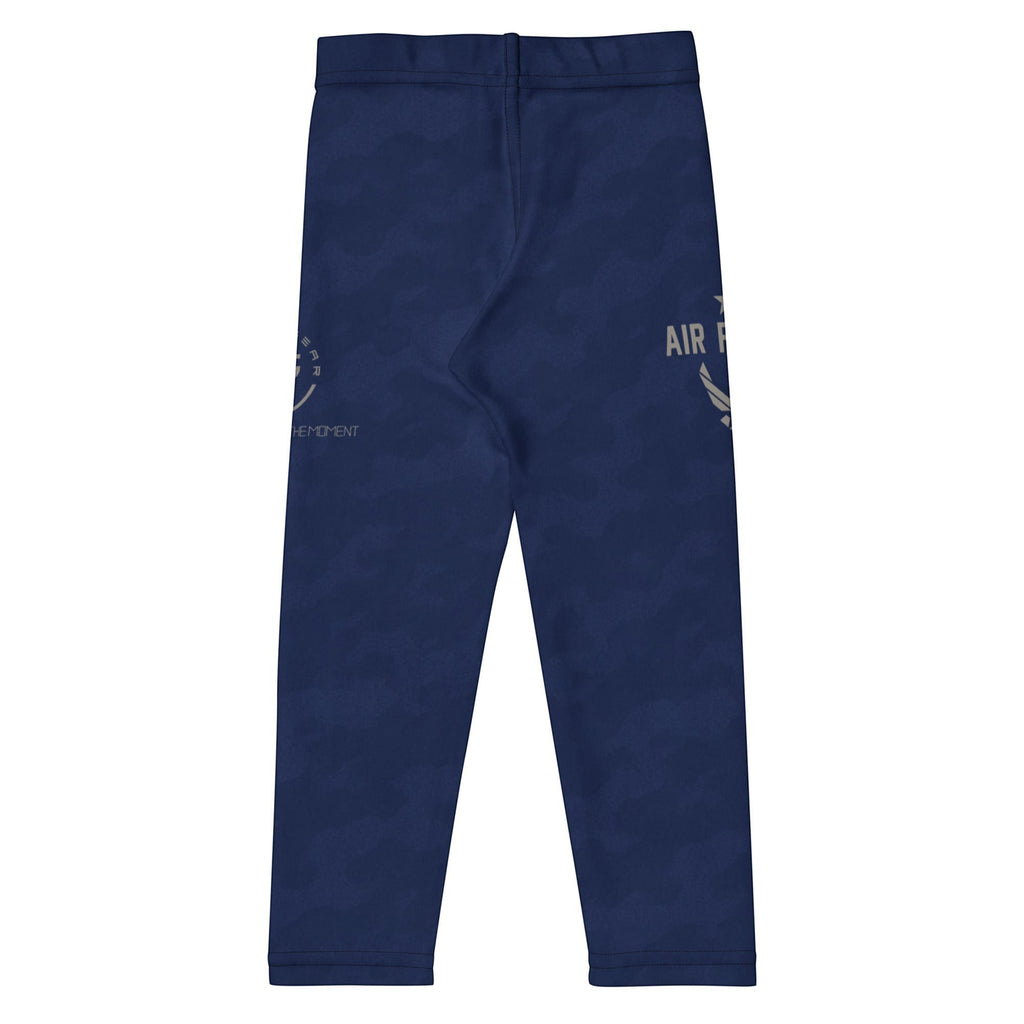 Roll Gear Kids Air Force Compression Spats in navy blue polyester-spandex blend with gold USAF insignia and aircraft detailing.
