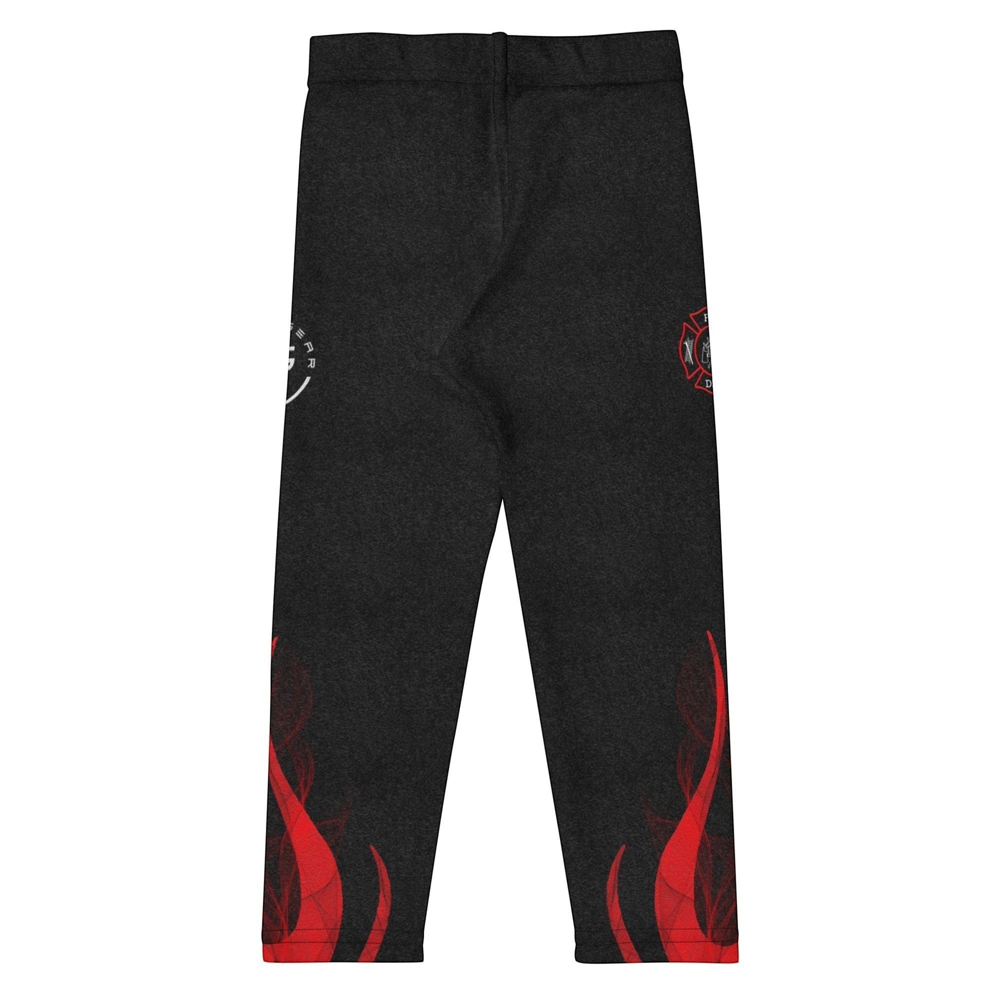 Roll Gear black compression spats for kids with red flame graphics and firefighter emblems. Four-way stretch polyester-spandex blend.