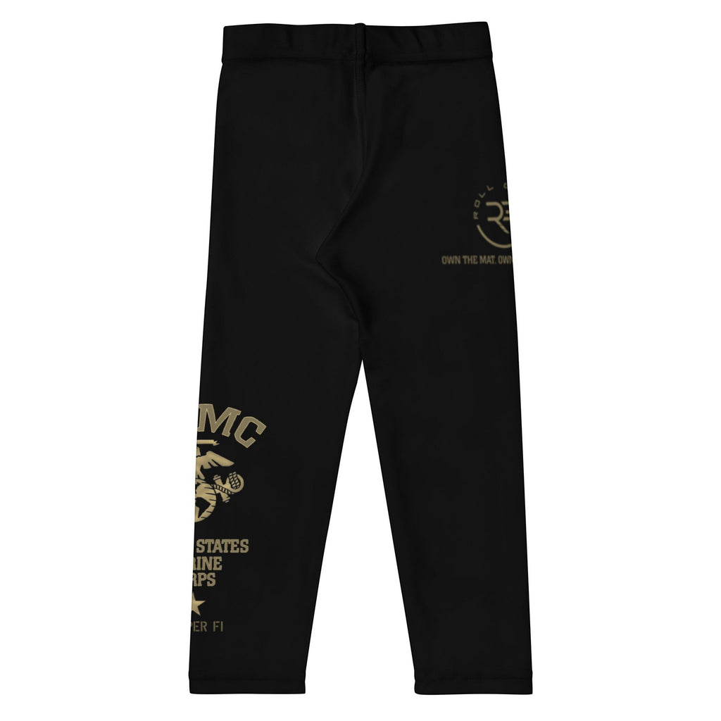Roll Gear Kids Marines Gold compression spats in black with gold USMC graphics. Four-way stretch polyester-spandex blend.