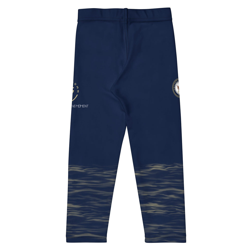 Roll Gear kids navy compression spats with ocean camo print and military insignia. Made of polyester and spandex.