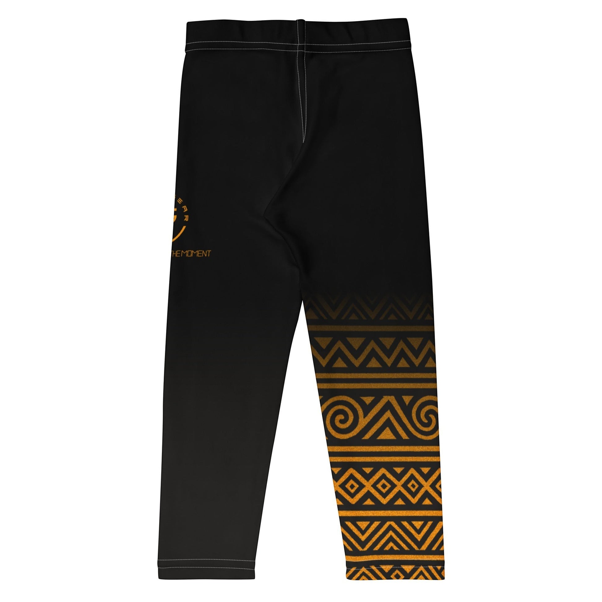 Roll Gear Lion's Pride kids spats in black with gold tribal pattern and logo. Moisture-wicking, 4-way stretch fabric.