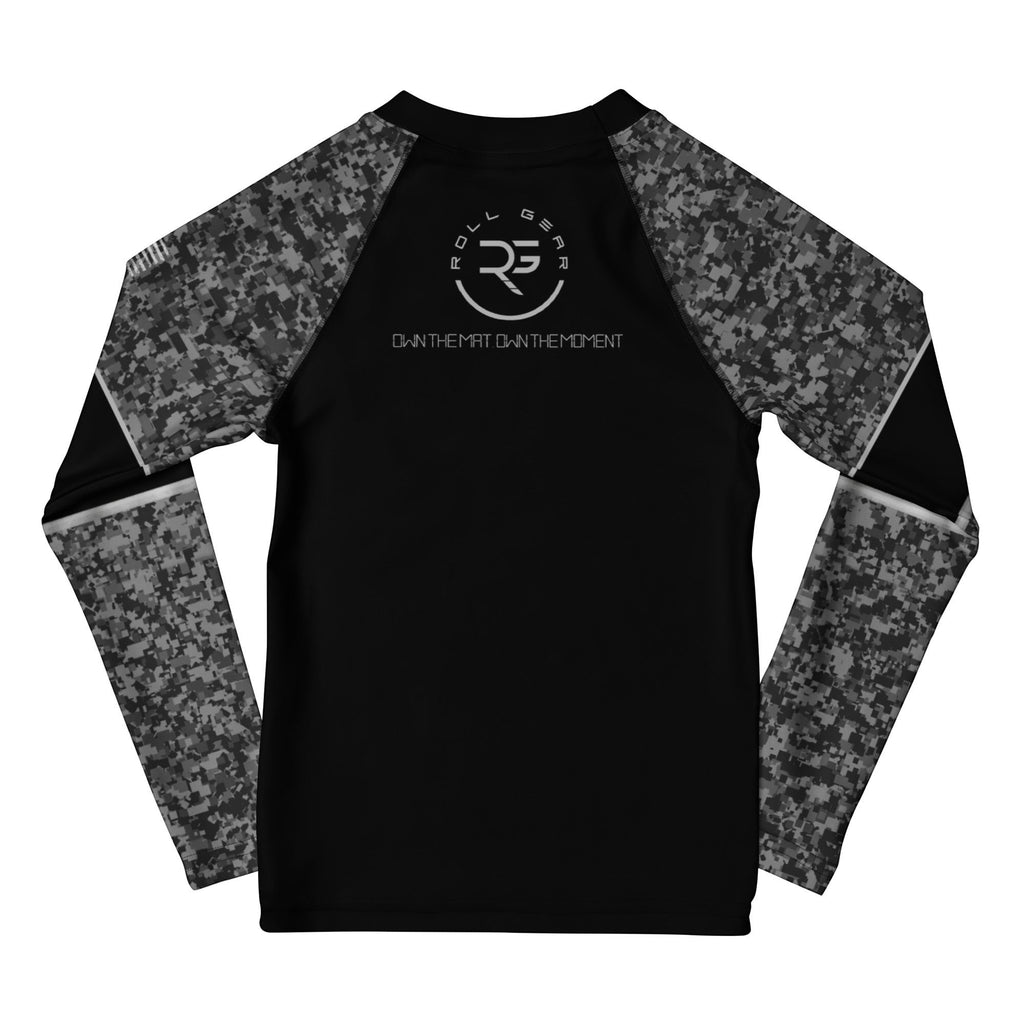 Roll Gear black long sleeve kids rash guard with urban camo sleeves and SWAT graphic. Made from stretch fabric.