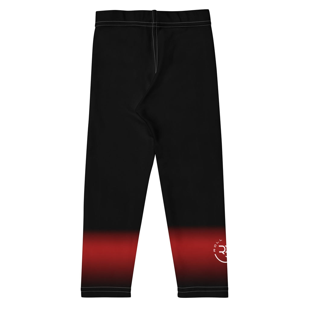Roll Gear kids' black and grey fade training spats with reinforced seams and a moisture-wicking fabric.