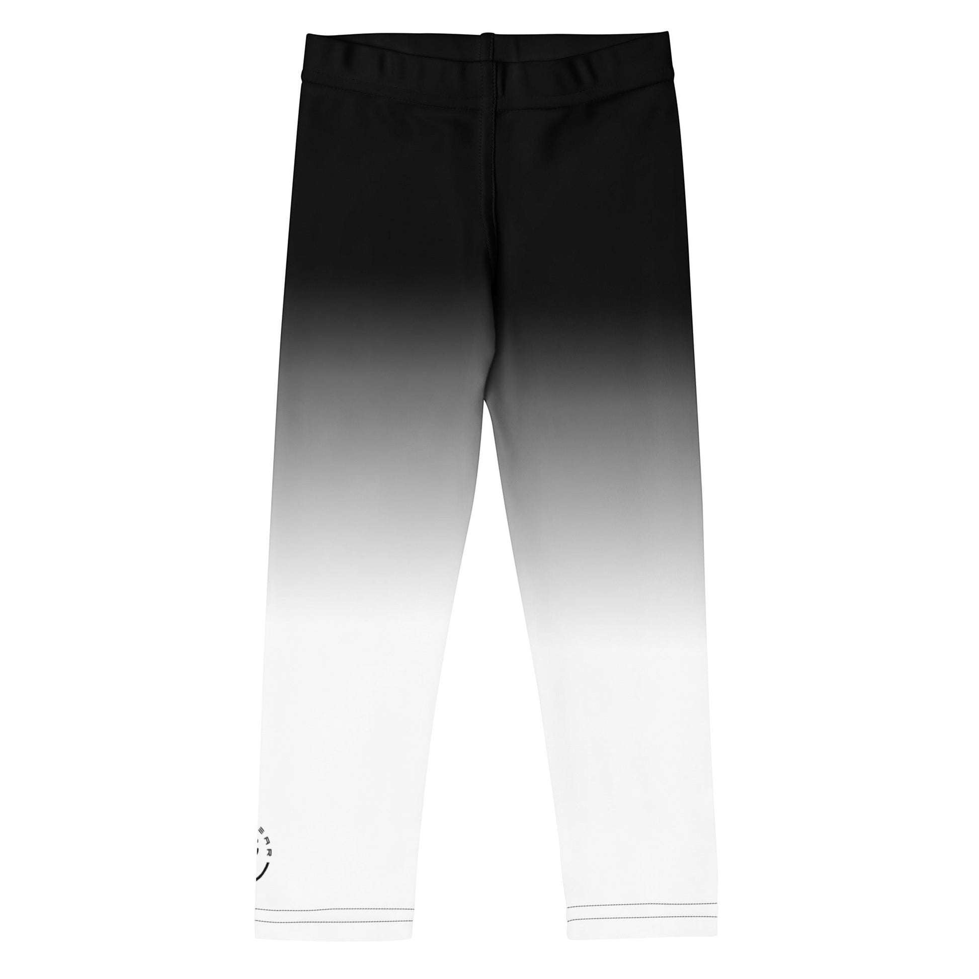 Roll Gear kids' white and black fade training spats. Moisture-wicking, 4-way stretch performance fabric with reinforced seams.