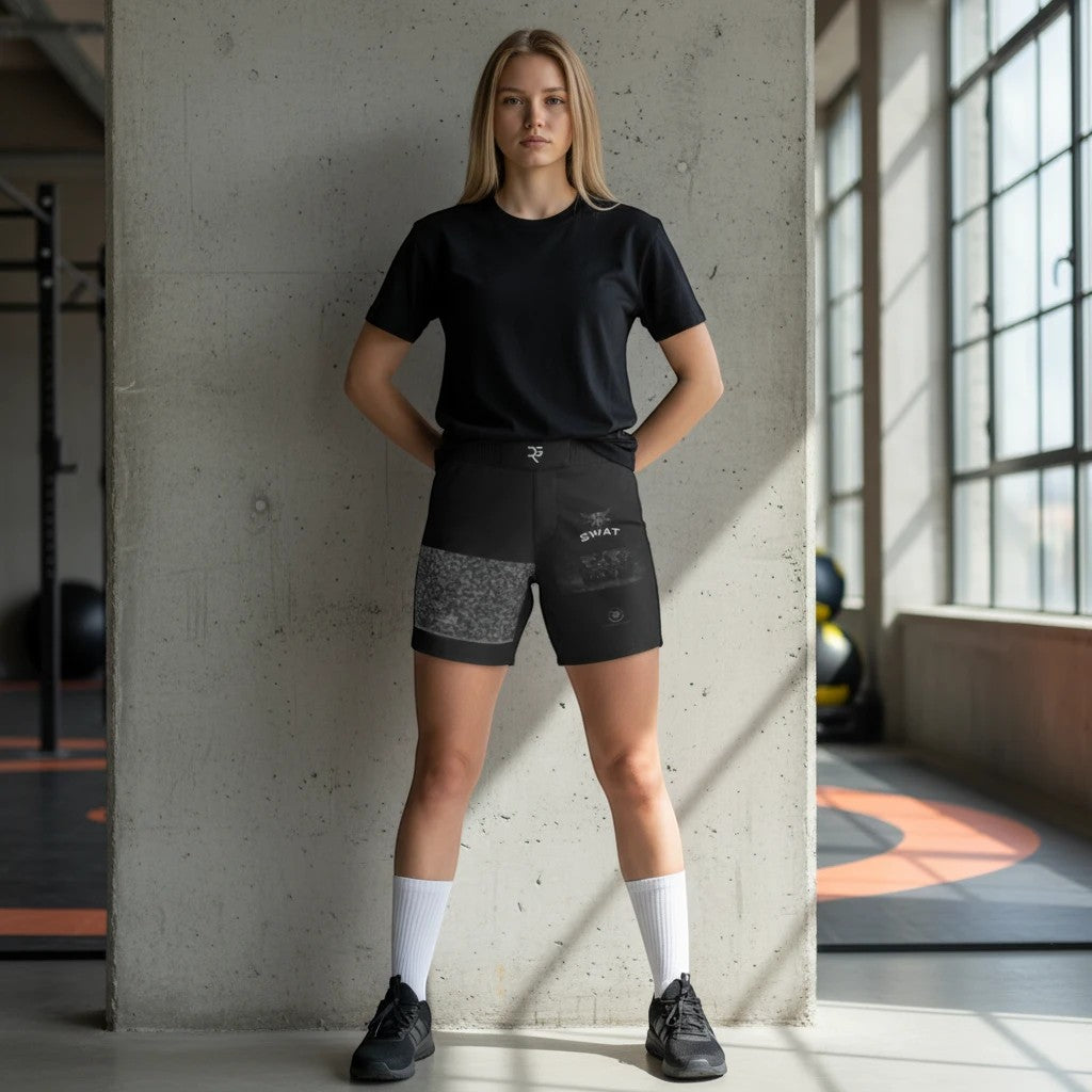 Roll Gear LLC black SWAT grappling shorts with 4-way stretch fabric, high waistband, and split-leg design.