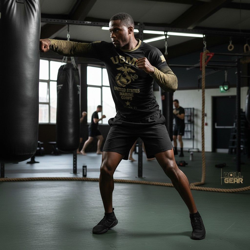 Roll Gear Men's Marines Gold Long Sleeve Rash Guard with USMC graphics and digital camo sleeves, worn by a man training.