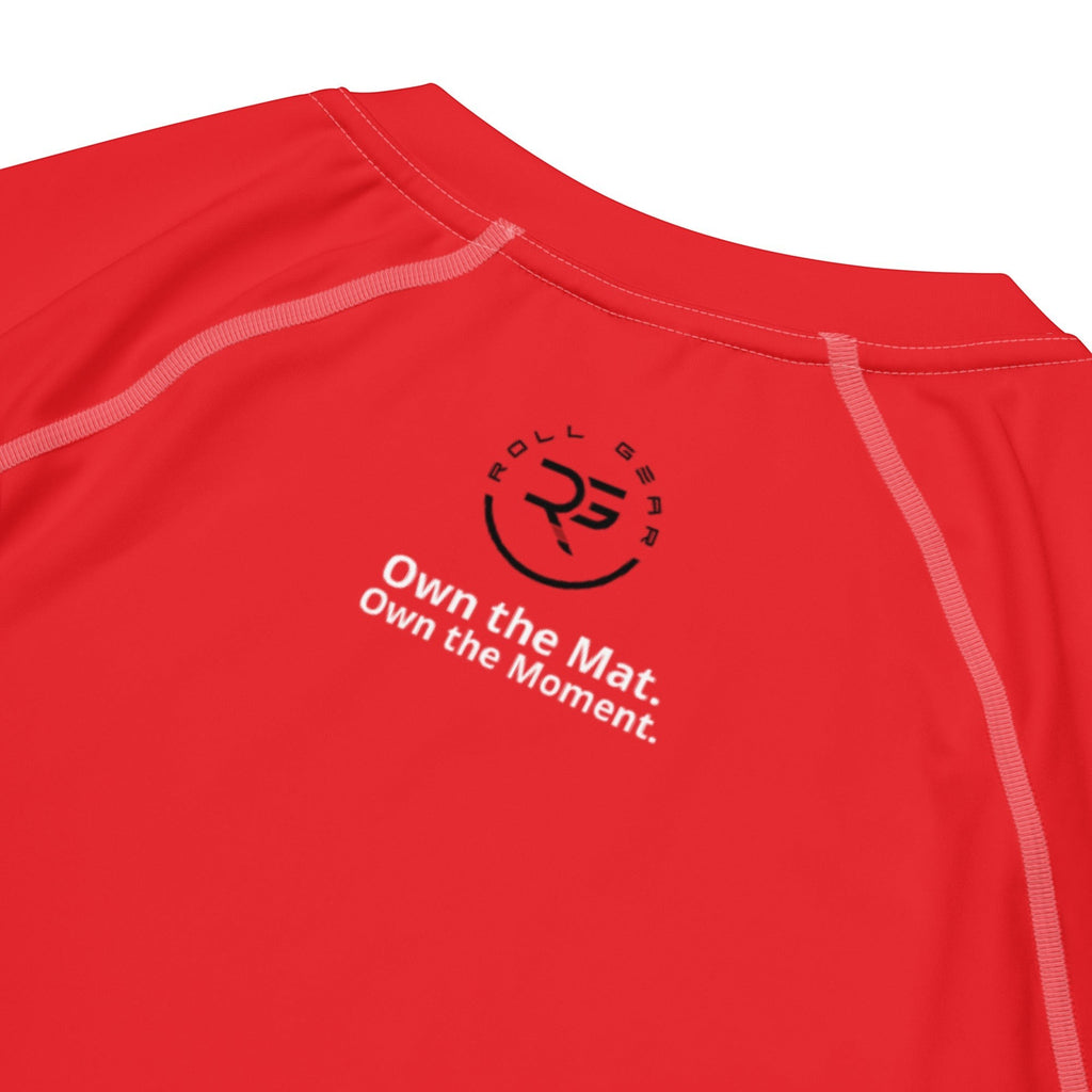 Roll Gear All Red Edition performance rash guard made from recycled polyester and spandex with flatlock seams and UPF 50+ protection.