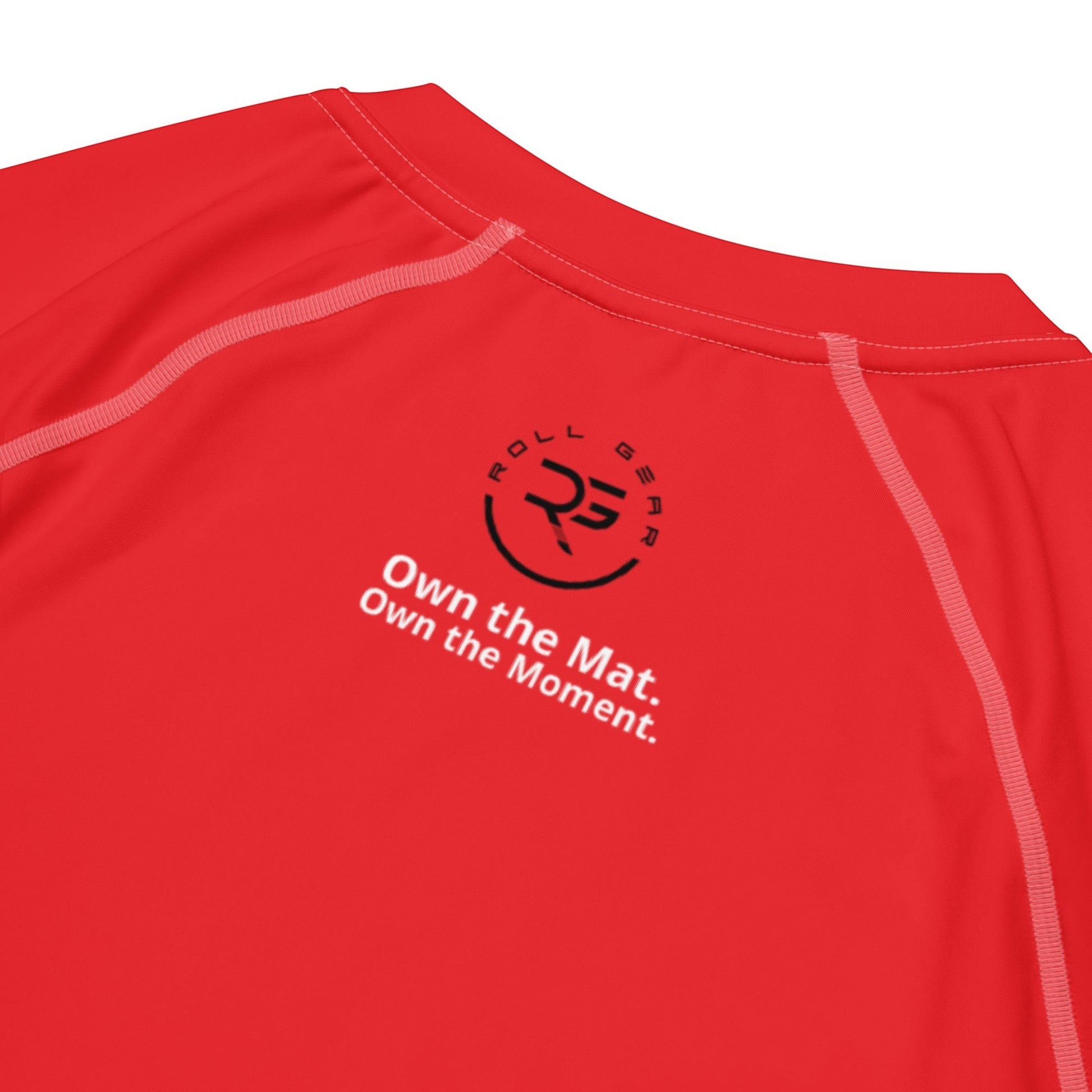 Roll Gear All Red Edition performance rash guard made from recycled polyester and spandex with flatlock seams and UPF 50+ protection.