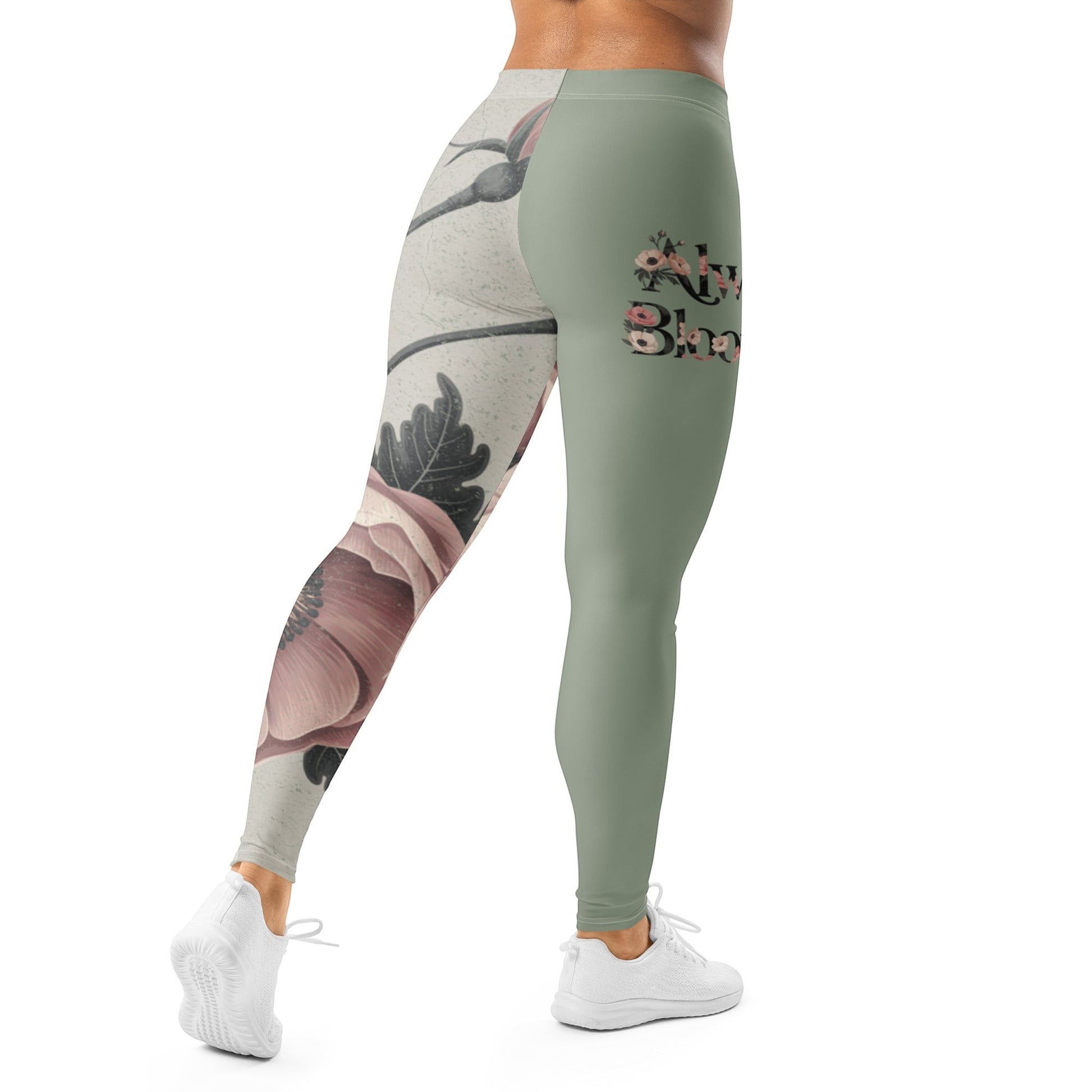 Roll Gear women's sage green athletic leggings with vintage floral print on one leg and text on the other.