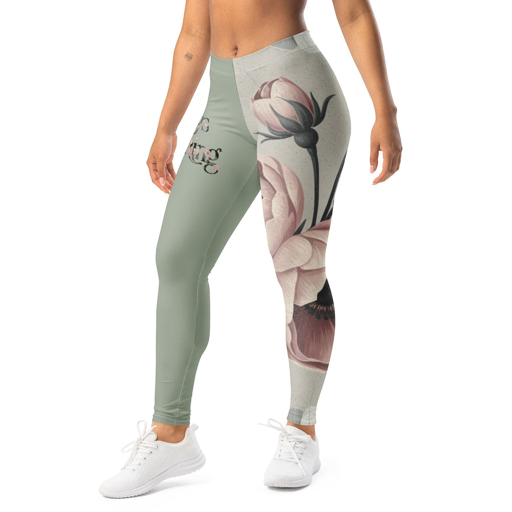 Roll Gear women's sage green athletic leggings with vintage floral print on one leg and text on the other.