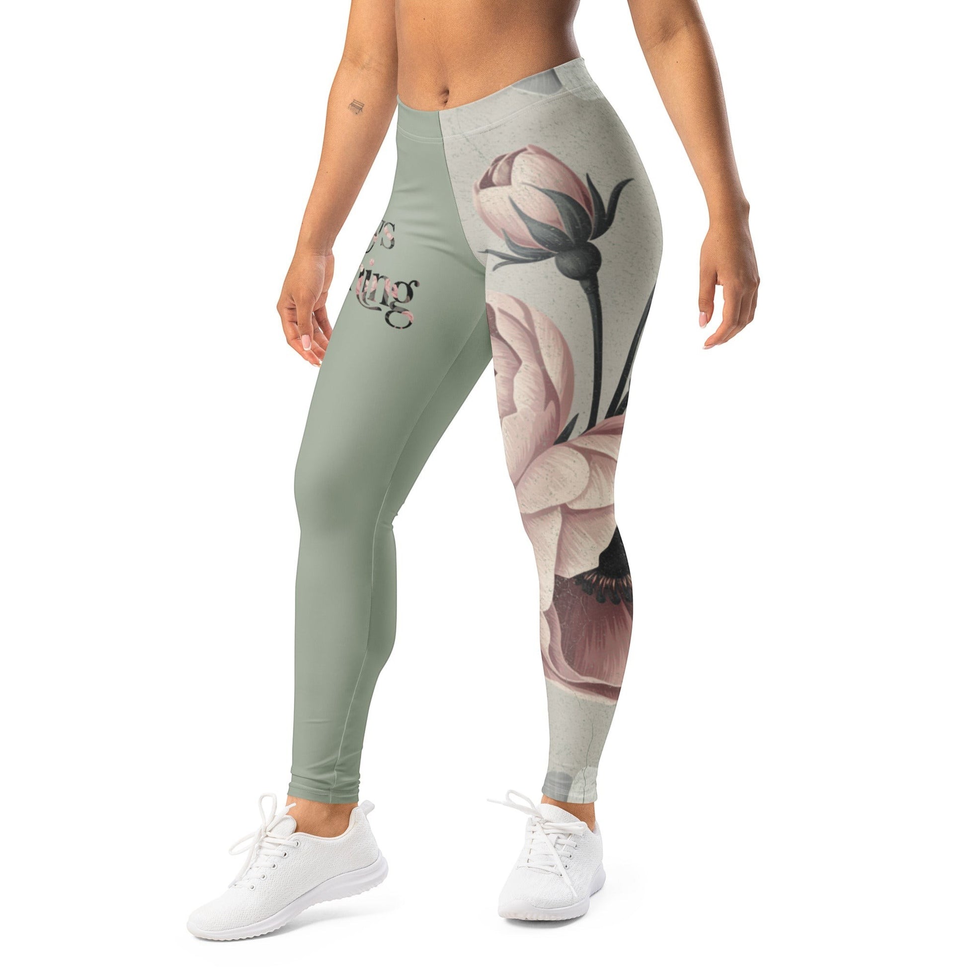 Roll Gear women's sage green athletic leggings with vintage floral print on one leg and text on the other.