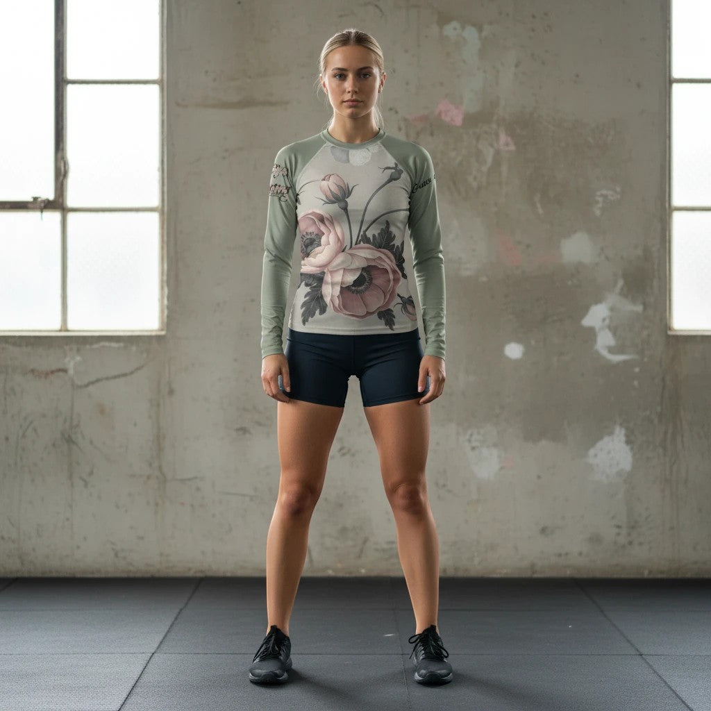 Roll Gear women's sage green long sleeve rash guard with floral print, moisture-wicking and UPF protective.