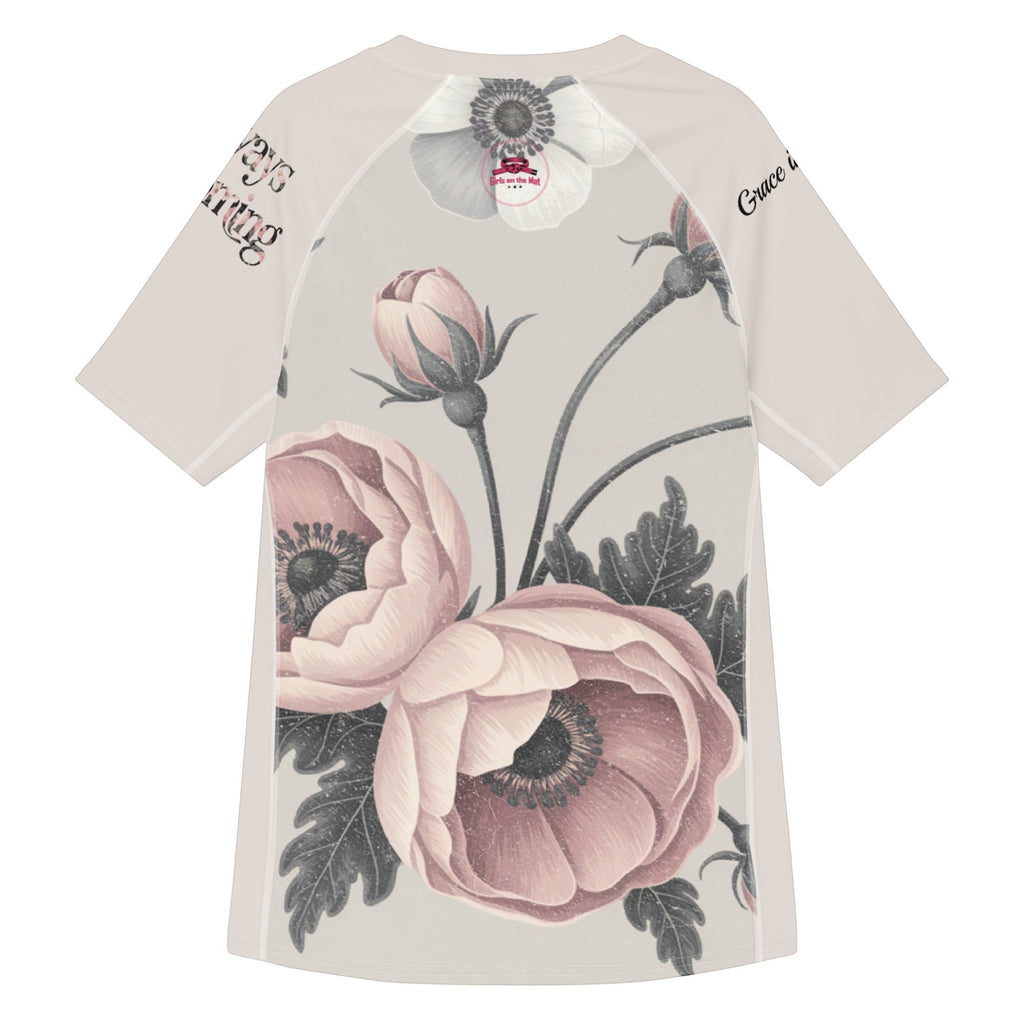 Roll Gear women's short sleeve rash guard with a vintage floral print in pink and grey. Features UPF 50+ protection.