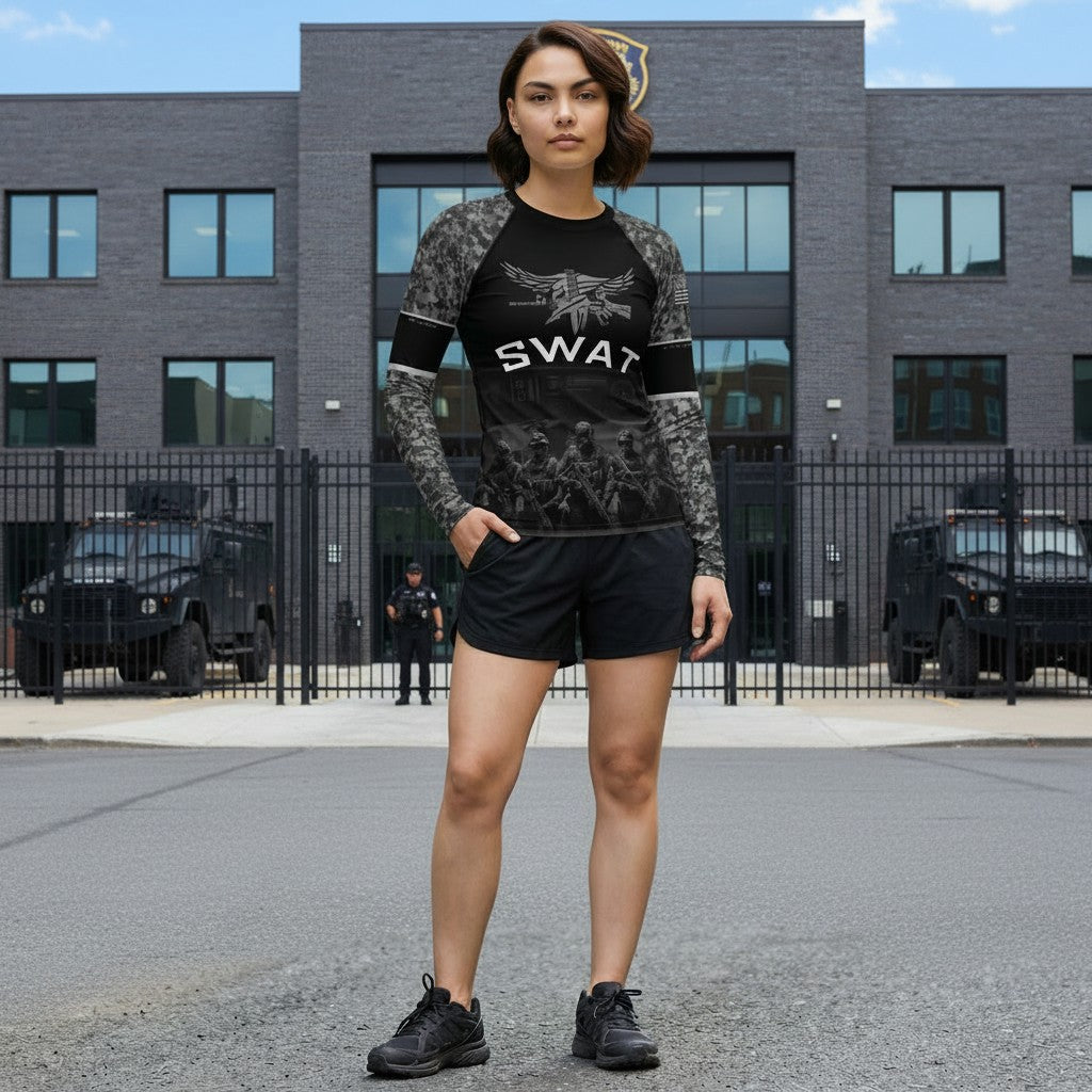 Roll Gear Women’s SWAT Edition long sleeve rash guard in black with urban camo sleeves, tactical graphics, and compression fit.
