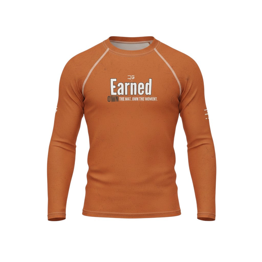 Roll Gear youth long sleeve rash guard in burnt orange with