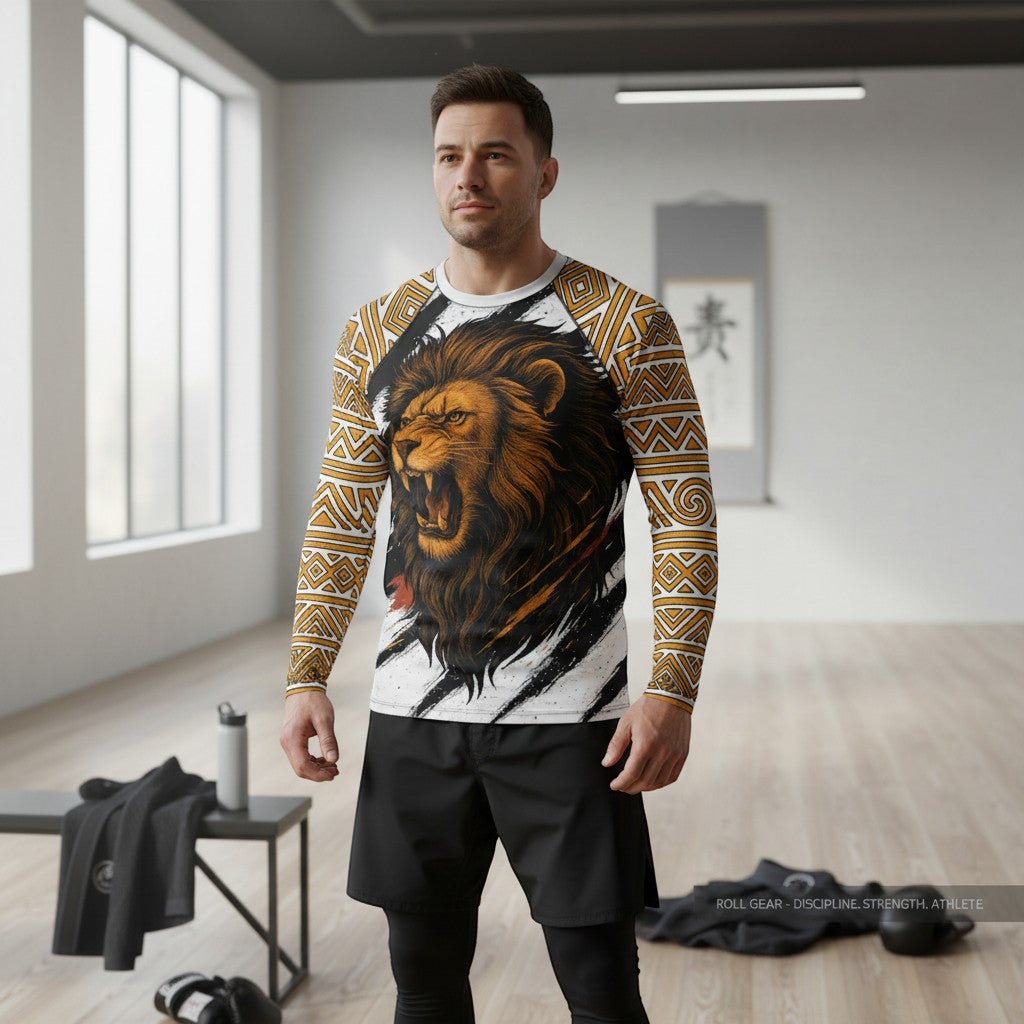 Roll Gear Lion's Pride men's white long sleeve rash guard with gold tribal sleeves and a roaring lion graphic.