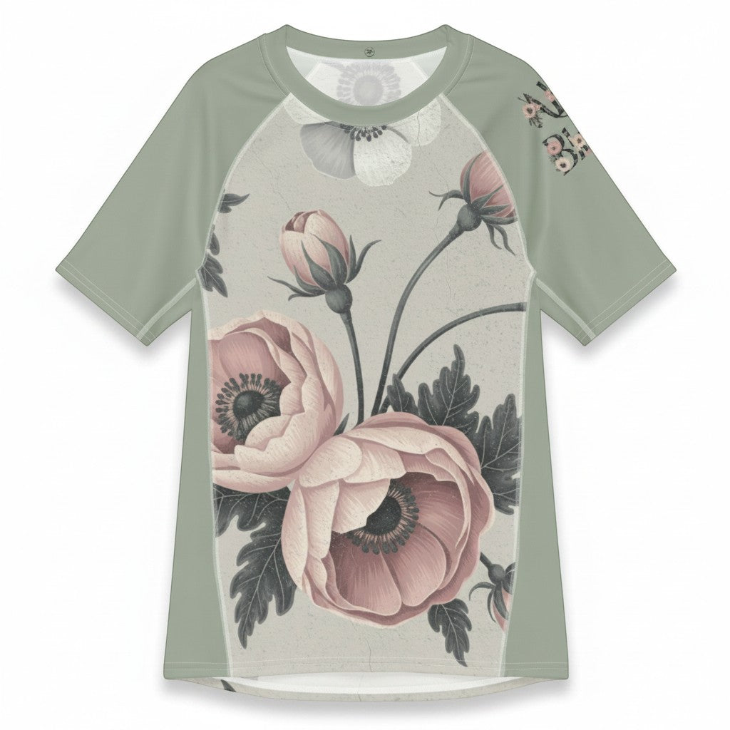 Roll Gear Always Blooming Rash Guard in sage green with a floral print. Short sleeve, moisture-wicking fabric.