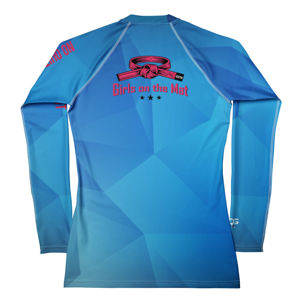 Blue athletic shirt with 'Girls on the Mat' logo on a white background